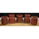 A collection of five terracotta open chimney pots/cowls, the largest 35cm high (5)