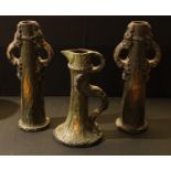 A pair of Bretby oak effect vases; a similar Bretby jug (3)
