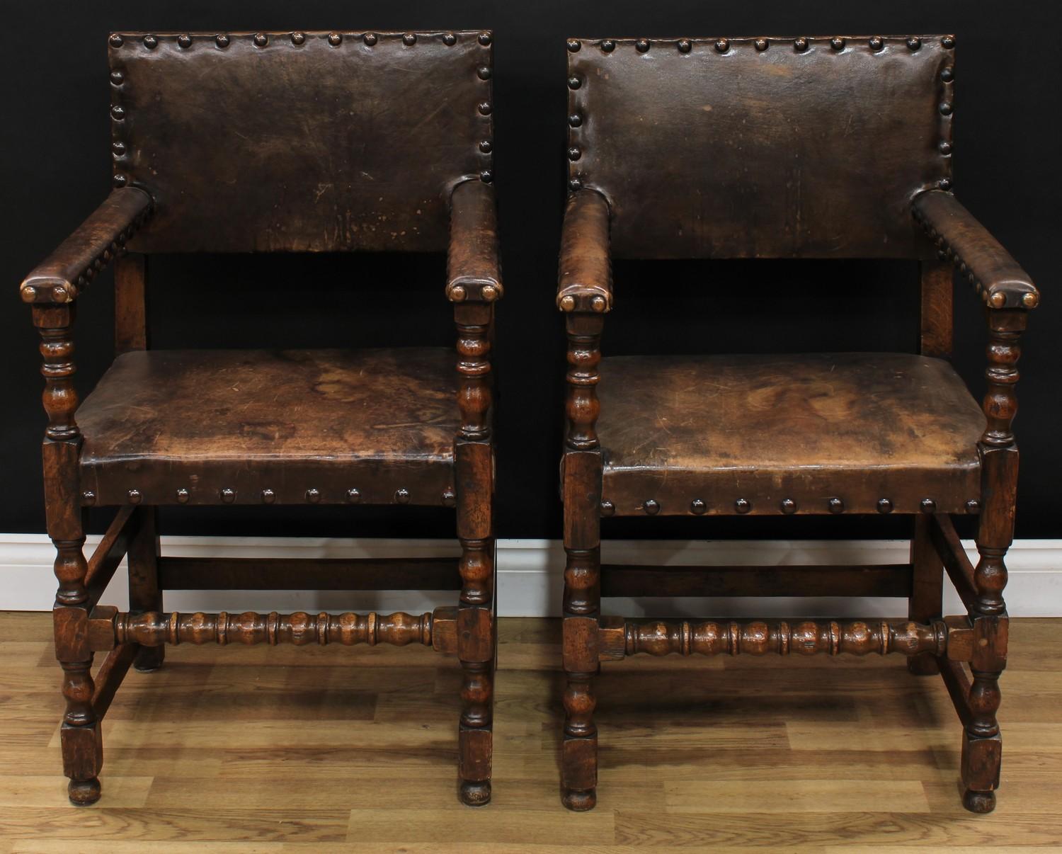 A pair of Cromwellian Revival open armchairs, in the manner of Augustus Welby Northmore Pugin,