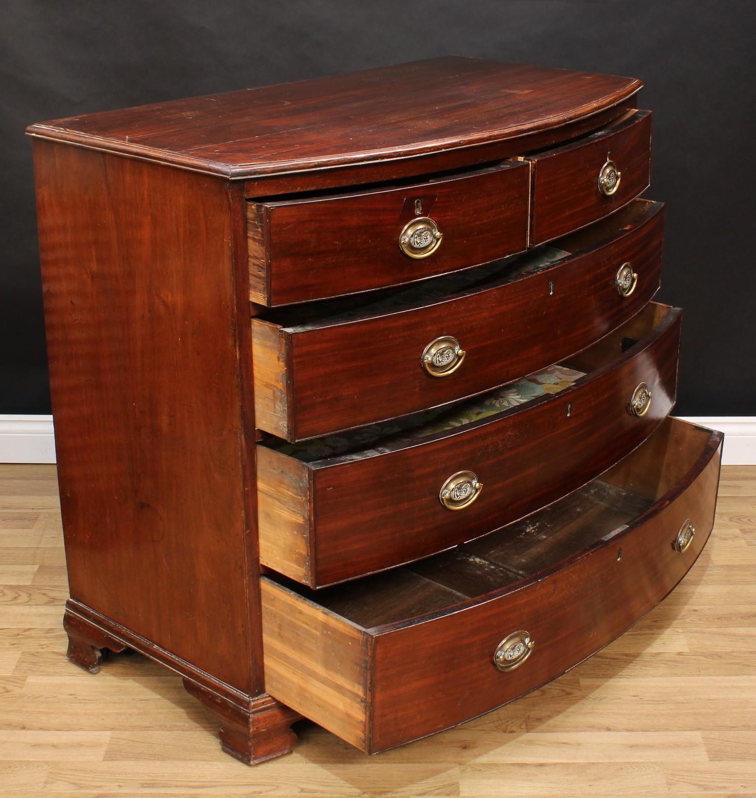 A Regency mahogany bow-front chest, slightly oversailing top with moulded edge above two short and - Image 3 of 4