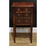 A George III style mahogany bedroom cabinet, rectangular top with moulded edge above a drawer and