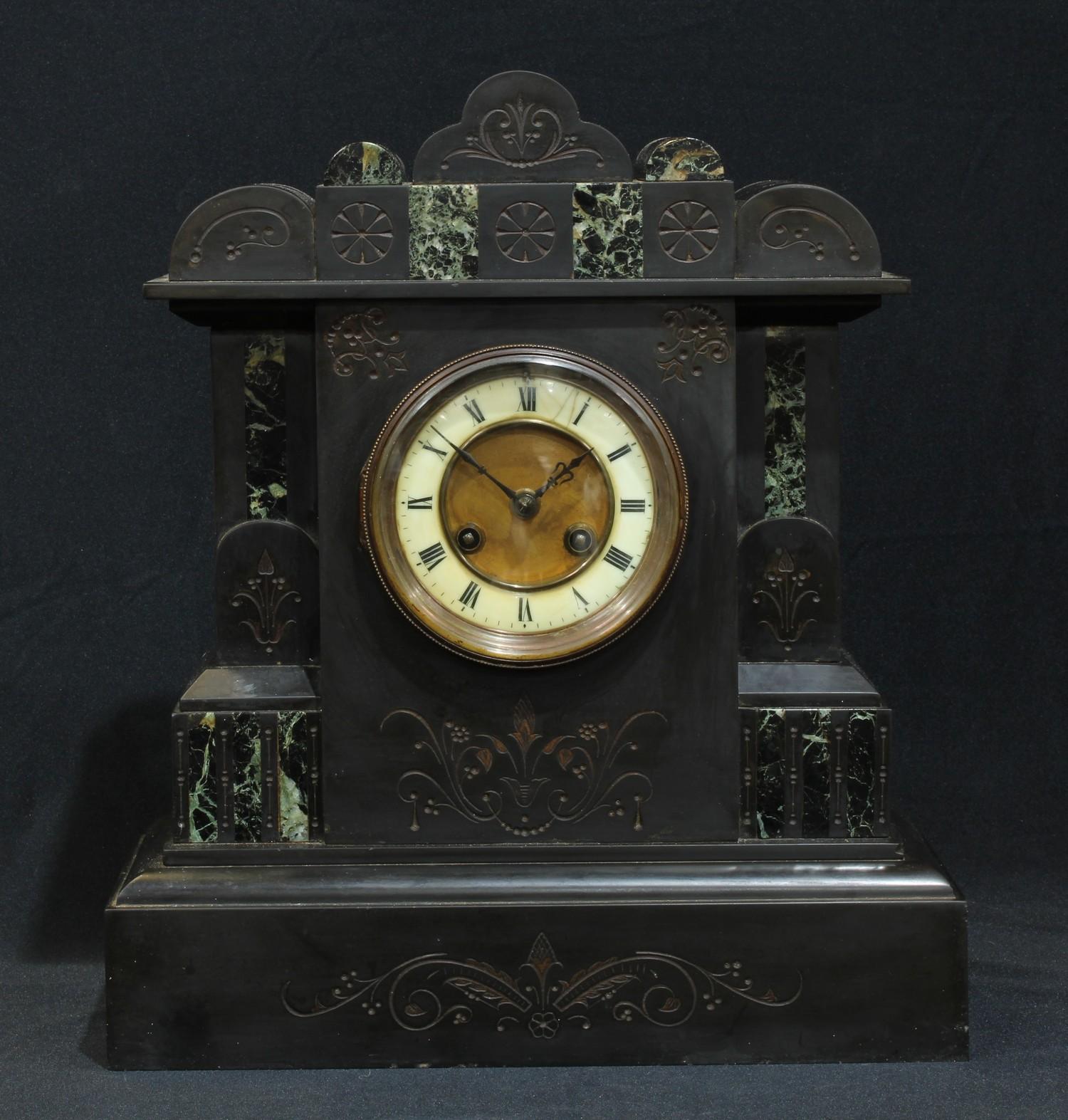 A Victorian black slate noir belge mantel clock, 37cm high, 32cm wide