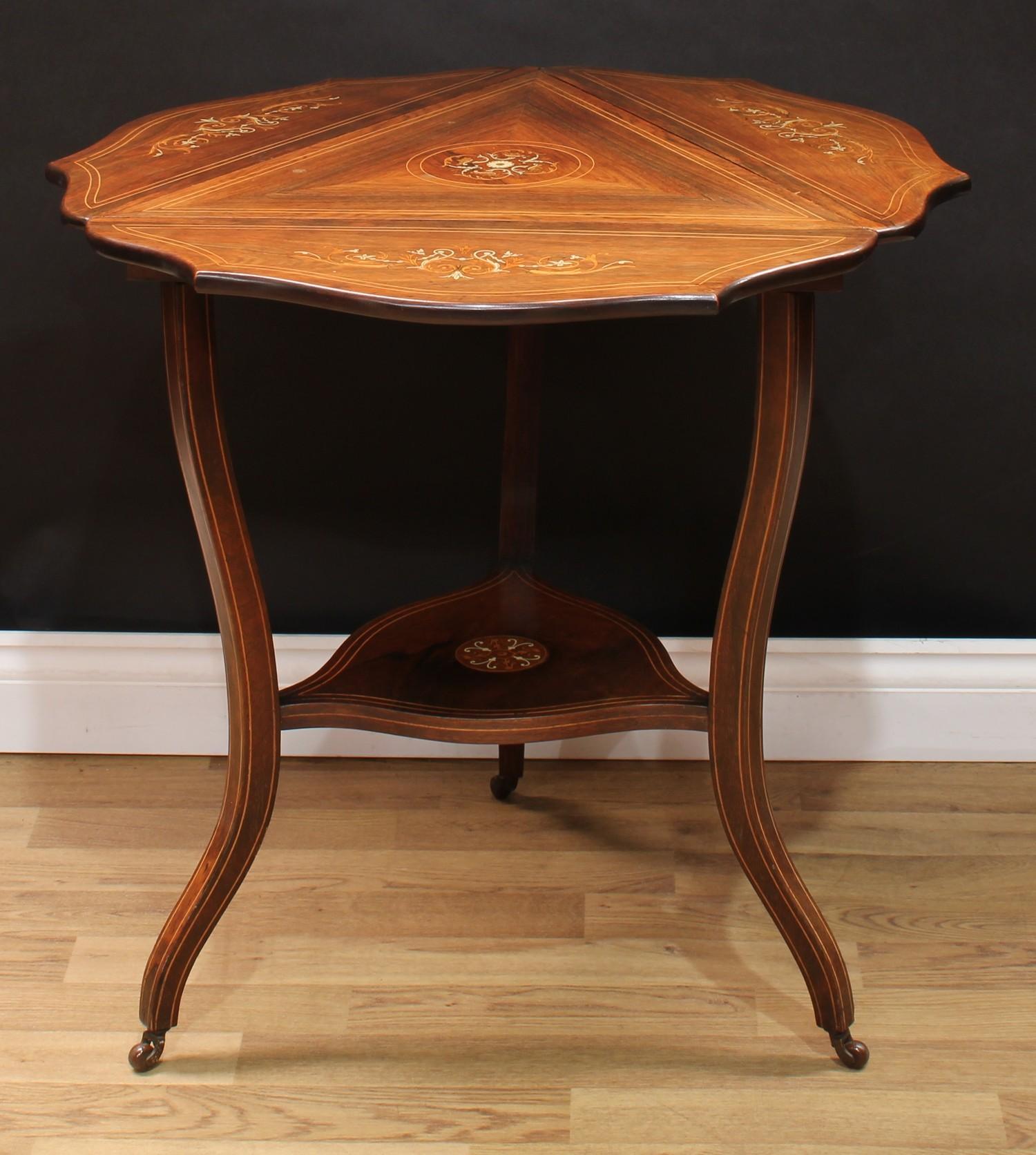A Sheraton Revival rosewood and marquetry centre table, serpentine circular top with three fall - Image 2 of 3