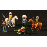 Toys - a collection of Britains painted lead Indian figures, various poses, some mounted on
