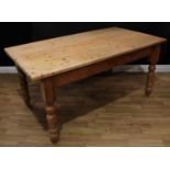 A large pine farmhouse kitchen table, drawer to frieze, turned legs, 77cm high, 168cm long, 90cm