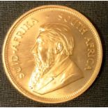 A South African Krugerrand 1oz Coin, 1975, 34 grams