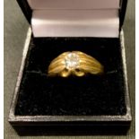 An 18ct gold gentleman's diamond solitaire signet ring, round old brilliant cut diamond measuring