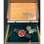 A Rolex Cellini no.4083 18ct gold lady's dress watch, orange sunburst oval dial, gold hands, the