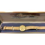 A Mathey-Tissot 14K Gold Liberty coin watch, white manual movement,