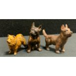 A small patinated cast metal model as a seated French Bulldog, 58mm high; another Terrier puppy ,