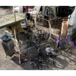 Wrought iron garden plant holders, garden bench ends etc. This lot must be collected from S44 5SU on