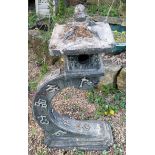 A reconstituted stone oriental bird house. 99cm high x 52cm wide. This lot must be collected from