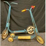 A Vintage 1970s MOBO toys, two wheel scooter, blue tubular metal chassis, white wheels, moulded