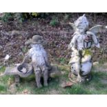 A reconstituted stone girl on a bench (af); a moulded polymer fairy with lantern. 79cm high. This