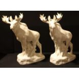 A ceramic model of a moose, glazed throughout in white, 35cm; another (2)