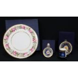 A Royal Worcester circular cake plate, Royal Garden pattern, printed with a band of roses, 32.5cm