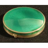 An early 20th century silver and enamel circular box, 6.5cm diam, import mark for London 1927