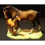 A Beswick mare and foal group