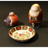 A Royal Crown Derby paperweight, Father Christmas, gold stopper; another, Robin, gold stopper; an
