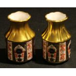 An associated pair of Royal Crown Derby Imari palette 1128 pattern golden primrose vases, 8.5cm,