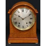 A Winterhalder & Hofmeier oak mantel clock, 15cm silvered dial, Roman numerals, the architectural