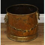 An early 20th century brass log bin, lion mask handles, pressed with knight on horseback, 32cm high