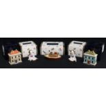 A Royal Crown Derby miniature model house, The Christmas Box, boxed; another, The China Shop, boxed;