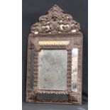 A 19th century French repousse cushion mirror, 59cm high