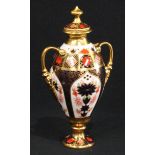 A Royal Crown Derby Imari palette 1128 pattern two handled pedestal vase, 17cm, printed mark in red