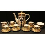 A Royal Crown Derby Imari 1128 pattern coffee pot, 21cm, six coffee cans and saucers, cream jug