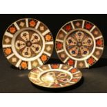 A pair of Royal Crown Derby Imari 1128 pattern tea plates, 16cm, first quality; another, 16.5cm,