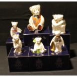 A Royal Crown Derby paperweight, Teddy Bear, gold stopper, boxed; other Royal Crown Derby Teddy Bear