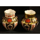 A Royal Crown Derby Imari palette 1128 pattern lobed ovoid vase, 8cm, printed marks in red;