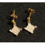 A pair of 9ct gold droplet earrings, pave illusion set with diamond chips, marked 375, 1.5g, boxed