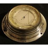 A George V silver aneroid barometer, 9.5cm diam, London 1913