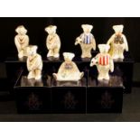 A Royal Crown Derby miniature model of a Teddy Bear, Red Footballer Bear, 9cm, printed marks, boxed;