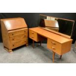A retro teak Austin suite dressing table and a 1940's bureau. (2)