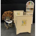 A 1960s Leeways pram, an Estmor painted wooden cot; white dome topped narrow book case with