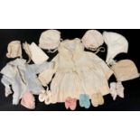 An early 1900's Debenhams & Freebody toddlers silk dress, with faux mother of pearl buttons,