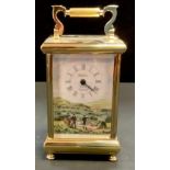 A Spode brass carriage clock with hand painted picnic scene, ceramic side panels. Boxed. 19.5cm