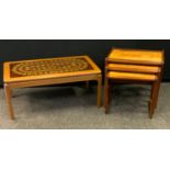 A retro mid 20th century coffee table, rounded rectangular tiled top, 41cm high, 92cm long, 51cm