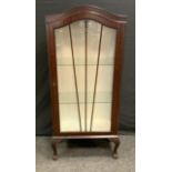 An Edwardian Mahogany arch topped display cabinet, single fan door, cabriole legs, paw feet, 129.5cm