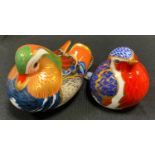 A Royal Crown Derby Mandarin Duck paperweight; another Robin, both gold stopper (2)