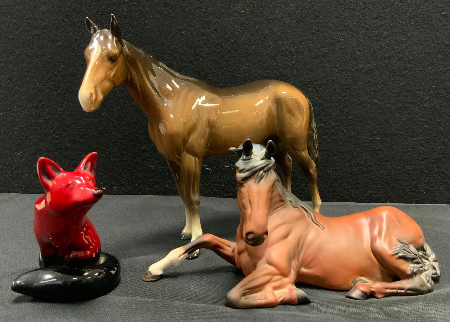 Animals - a Royal Doulton flambe model Seated Fox; a Beswick model standing Bois Roussel racehorse