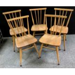 Five retro spindleback dining chairs.