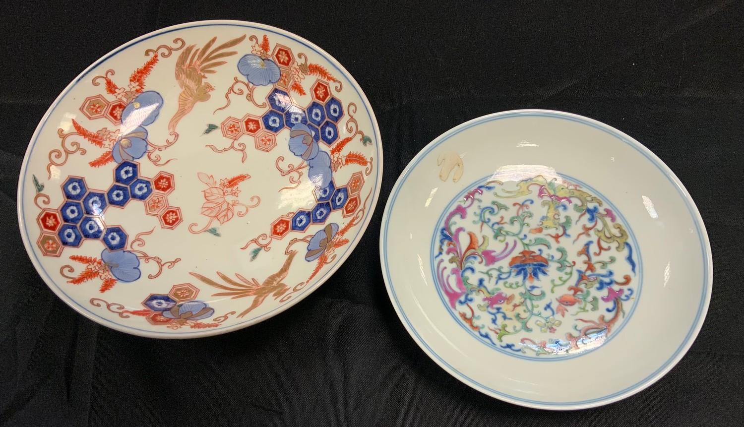 A Chinese dished bowl, decorated with fancy full birds, blossoms and hexagonal block panels; another