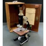 A Charles Perry microscope, cased.