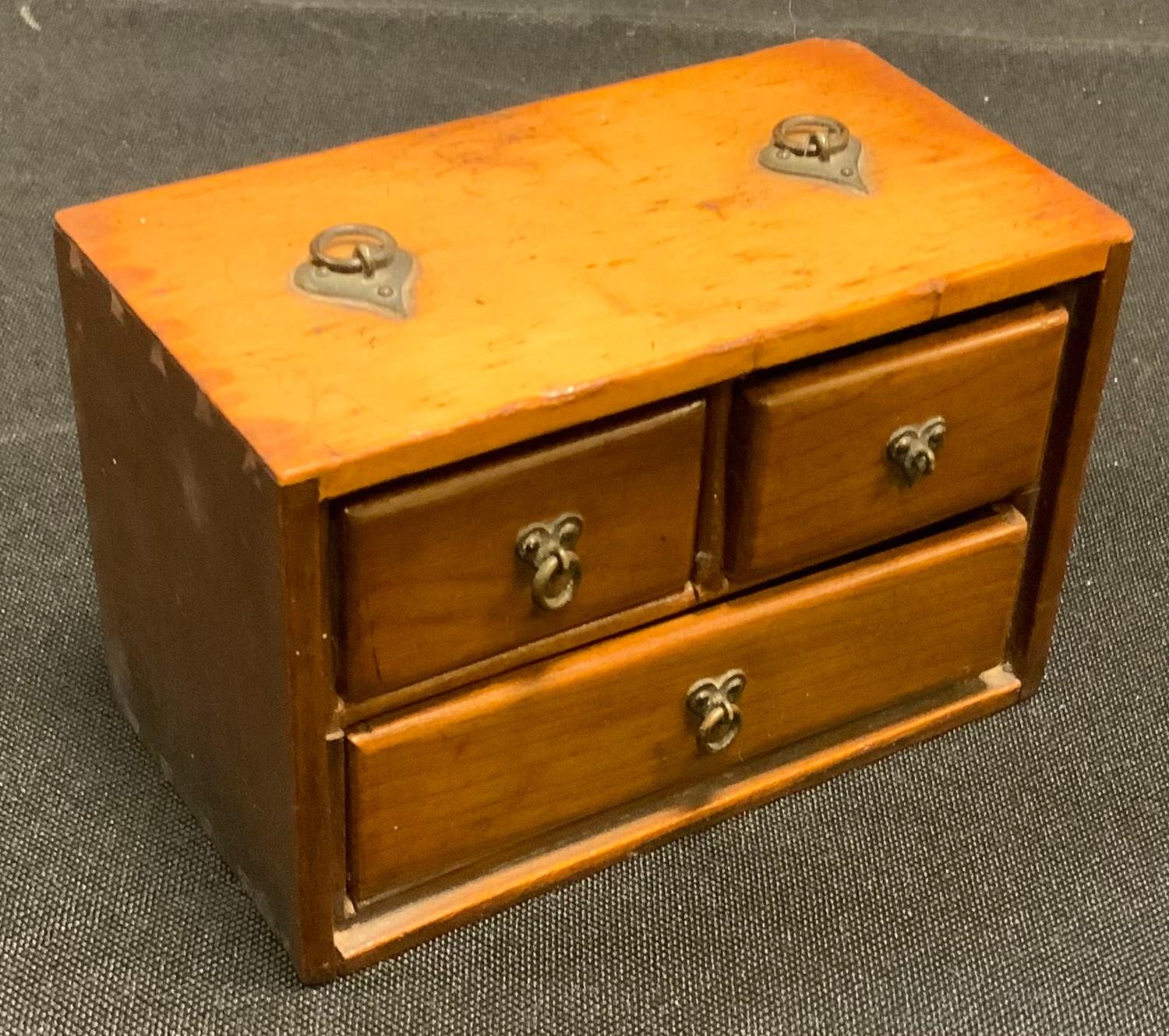 A small Chinese boxwood travelling spice chest of two short over single long drawer, 64mm high,