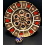 A Royal Crown Derby 1128 imari dinner plate, 26.5cm diameter, 1st; a Millennium Bug paperweight,