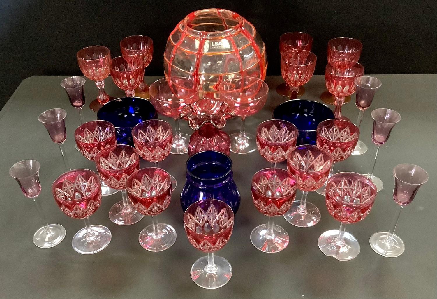 Ruby flash wine glasses, Bristol Blue vases, LSA globular vase, others.